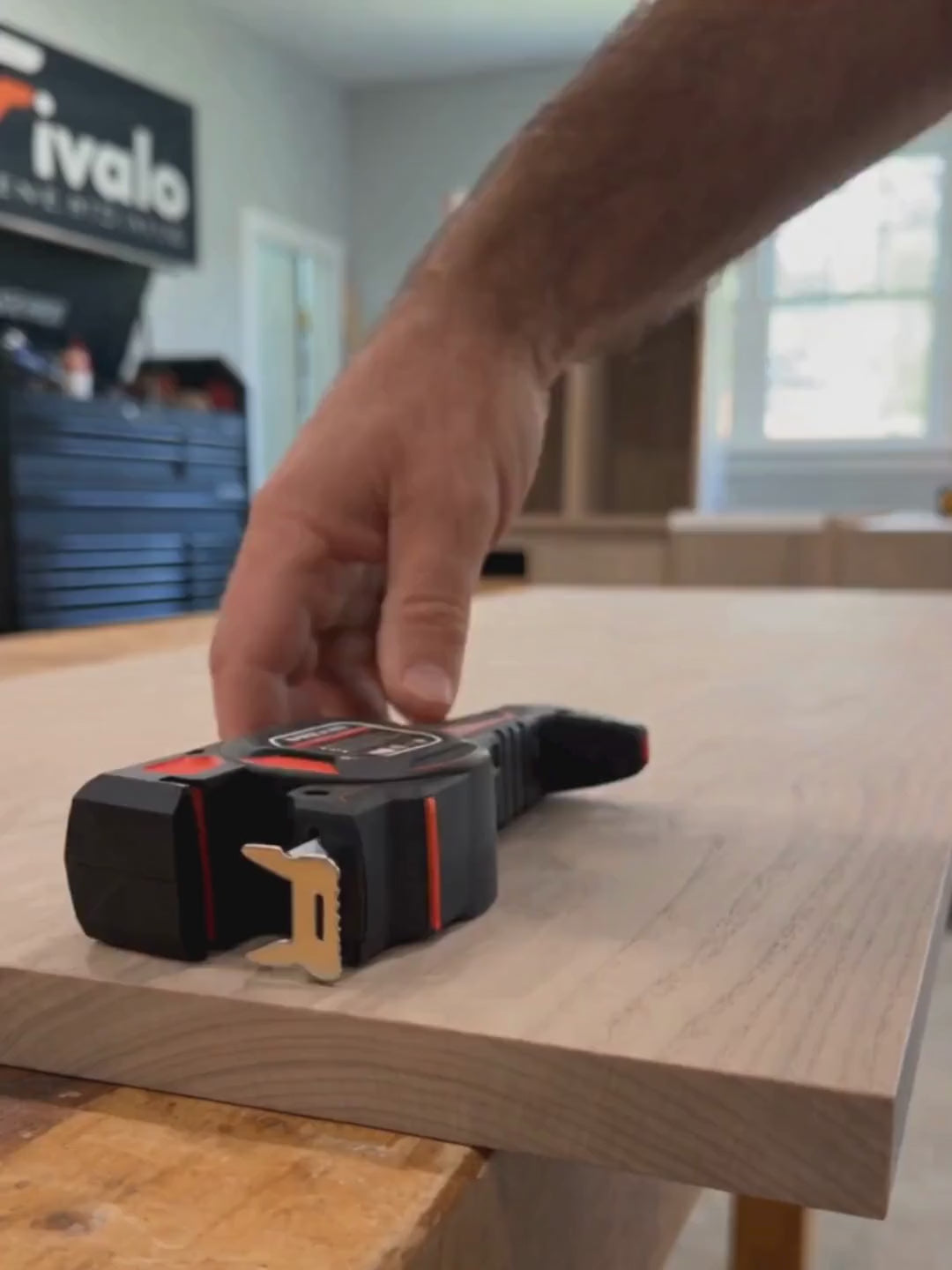 Load video: Fivalo 3-in-1 laser alignment tape measure used during cabinet installation