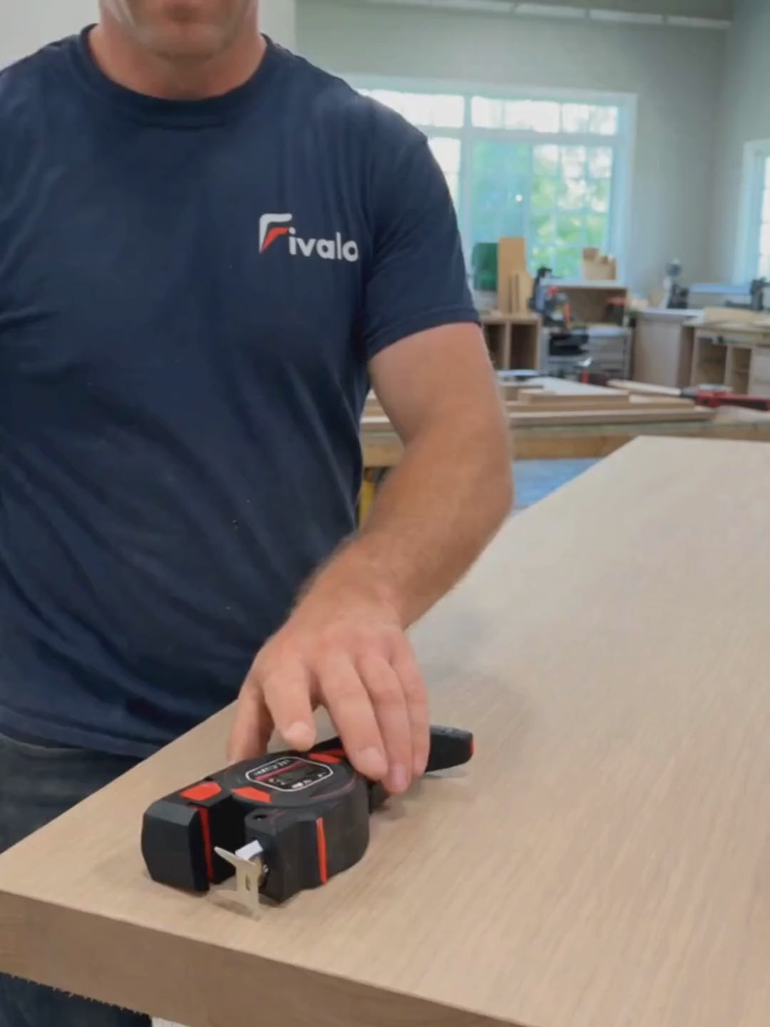 Load video: Fivalo 3-in-1 laser alignment tape measure used during cabinet installation